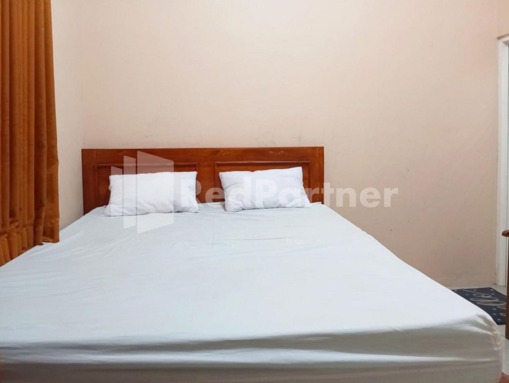 Isa Mitra Reddoorz Hotel
